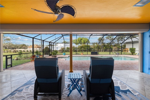 view of patio / terrace featuring a lanai and an outdoor pool