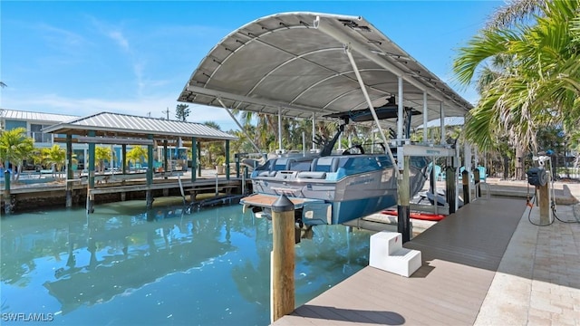 view of dock with a water view and boat lift