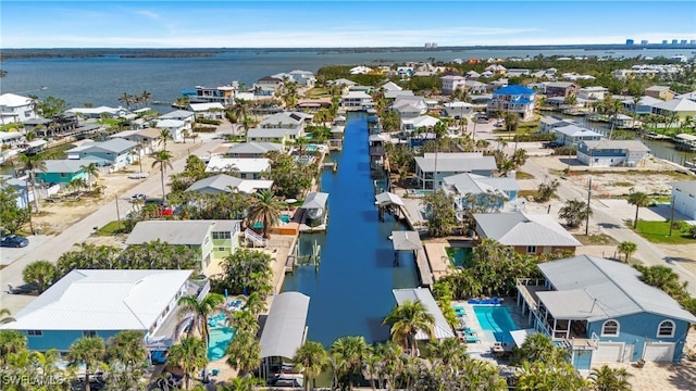 aerial view featuring a residential view and a water view