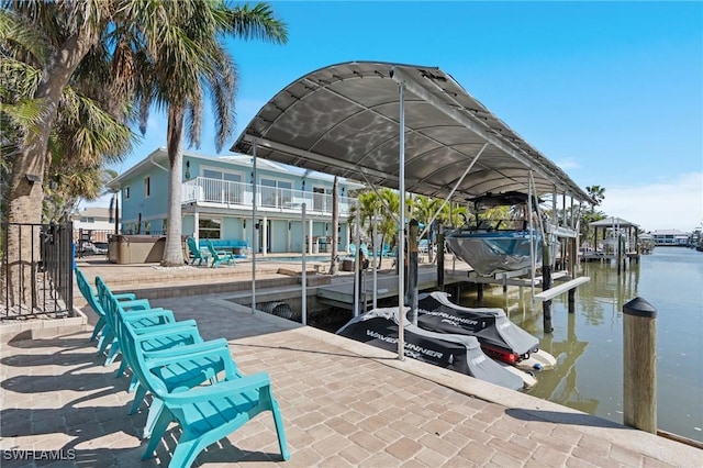 view of dock featuring a water view and boat lift