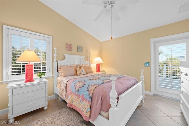 bedroom featuring access to exterior, baseboards, vaulted ceiling, and light tile patterned flooring