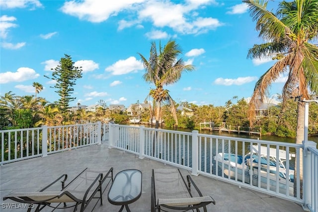 view of patio / terrace with a water view