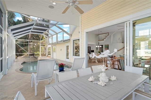 sunroom / solarium with vaulted ceiling and ceiling fan