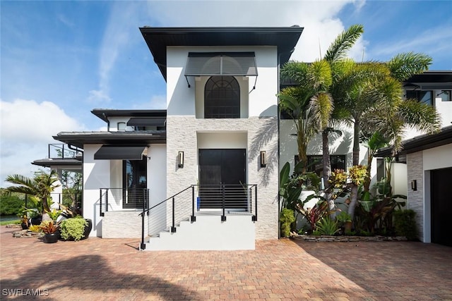 view of front of home with stucco siding