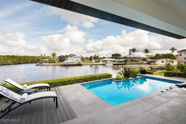 view of swimming pool with a water view