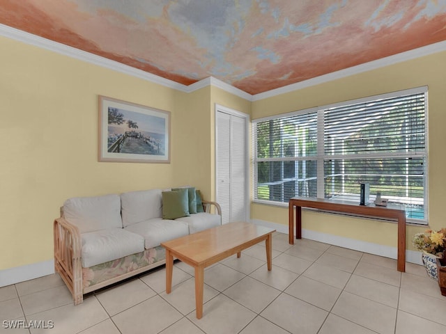 living area featuring light tile patterned floors, baseboards, and crown molding