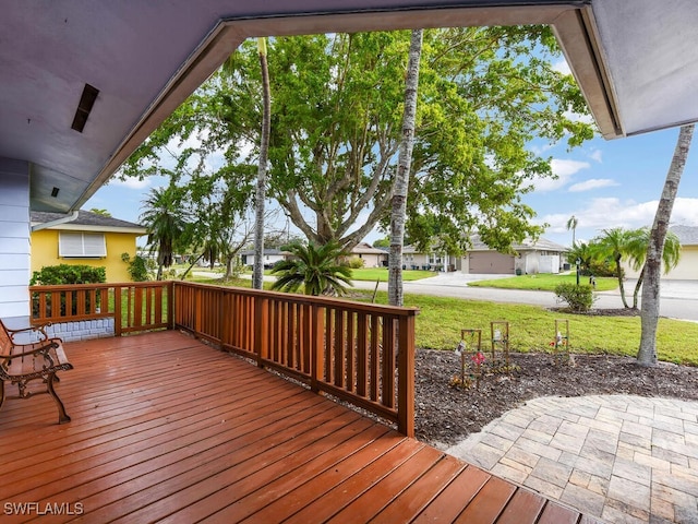 wooden deck with a yard