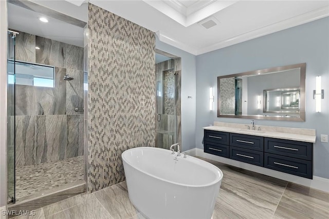 full bathroom featuring vanity, a soaking tub, walk in shower, crown molding, and marble finish floor