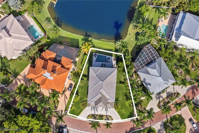 birds eye view of property with a residential view