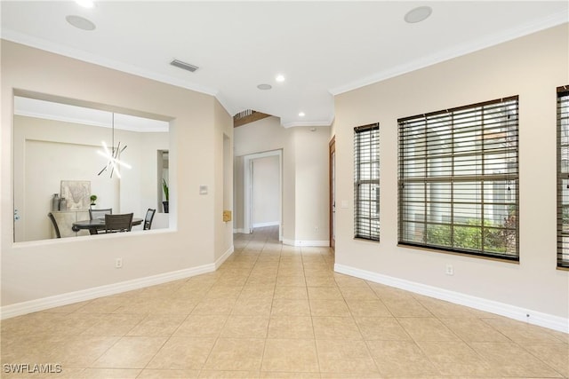 unfurnished room featuring visible vents, crown molding, baseboards, and light tile patterned floors