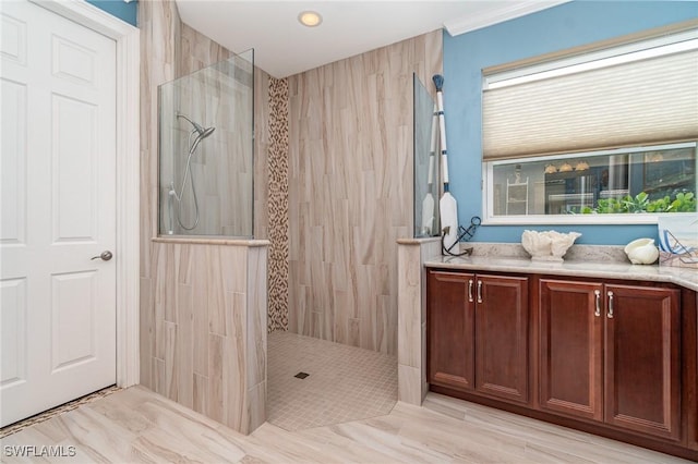 bathroom featuring vanity and walk in shower