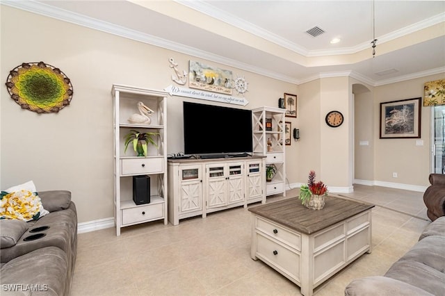 living area with baseboards, visible vents, arched walkways, crown molding, and light tile patterned flooring