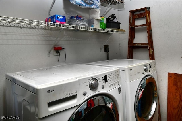 laundry area featuring laundry area and washing machine and dryer