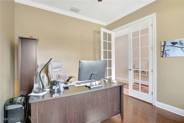 home office with visible vents, baseboards, ornamental molding, french doors, and dark wood finished floors