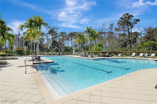 pool with a patio area