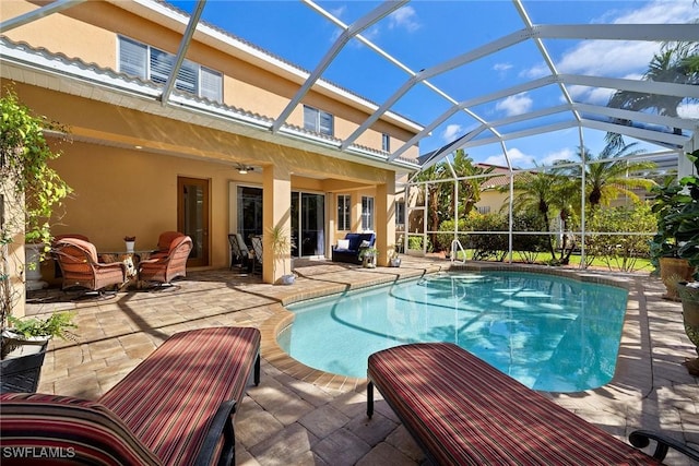8840 Paseo De Valencia St, Fort Myers, FL 33908 - pool with a patio area, a lanai, and a ceiling fan