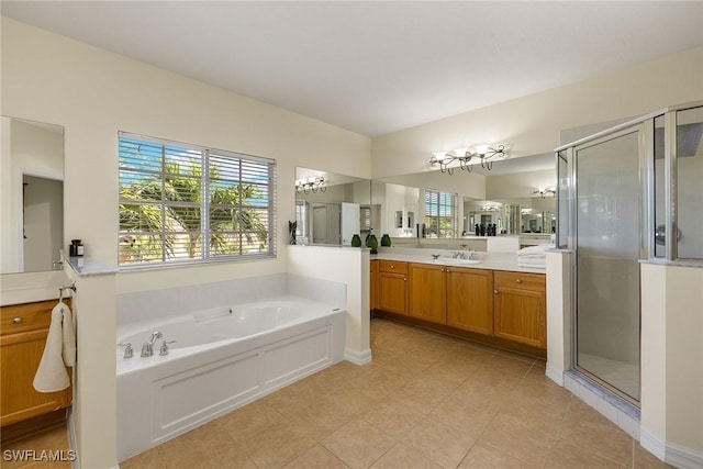 8840 Paseo De Valencia St, Fort Myers, FL 33908 - full bathroom with tile patterned floors, a shower stall, vanity, and a bath