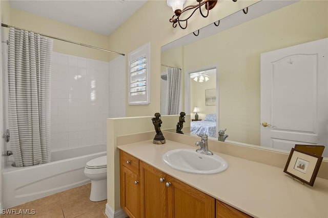 8840 Paseo De Valencia St, Fort Myers, FL 33908 - full bathroom featuring tile patterned flooring, toilet, shower / tub combo, vanity, and ensuite bath