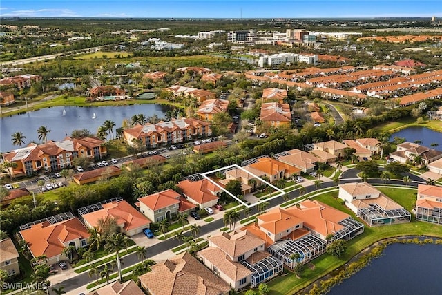 8840 Paseo De Valencia St, Fort Myers, FL 33908 - birds eye view of property featuring a water view and a residential view