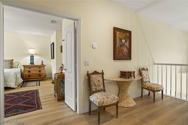 8840 Paseo De Valencia St, Fort Myers, FL 33908 - sitting room featuring light wood finished floors, baseboards, and visible vents