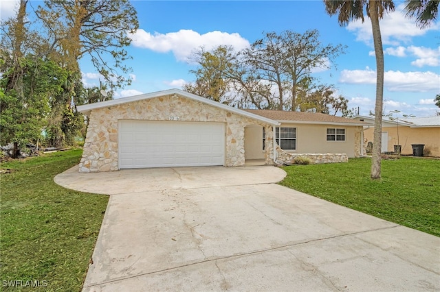 view of front of property featuring a garage, stone siding, concrete driveway, and a front yard