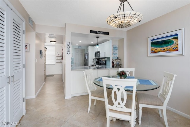 view of tiled dining area