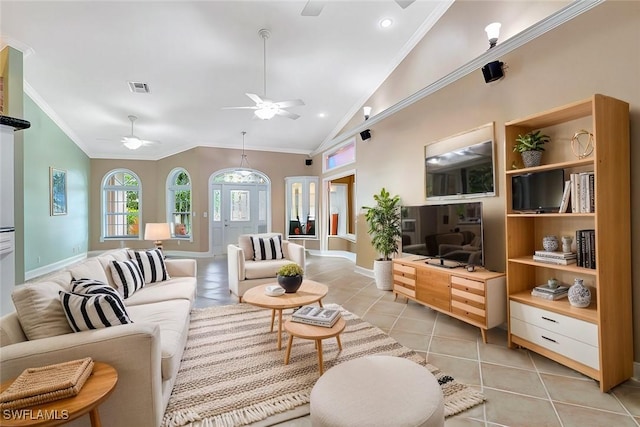 living area with visible vents, a ceiling fan, lofted ceiling, crown molding, and light tile patterned flooring