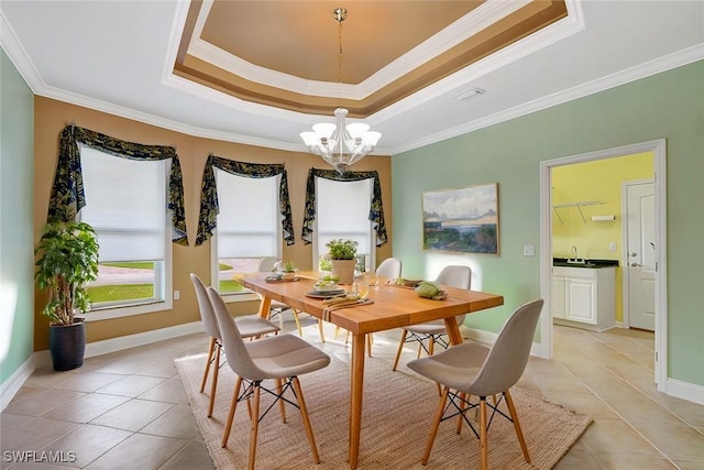 dining space with a chandelier, light tile patterned floors, visible vents, ornamental molding, and a raised ceiling