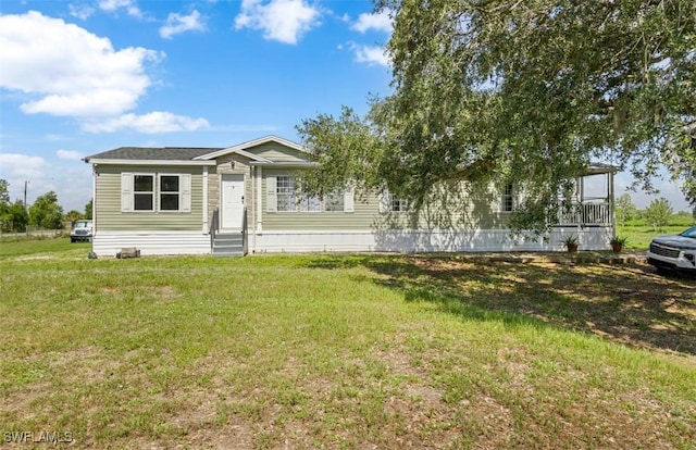 1132 W Red Rd, Labelle, FL 33935 - manufactured / mobile home with a front lawn
