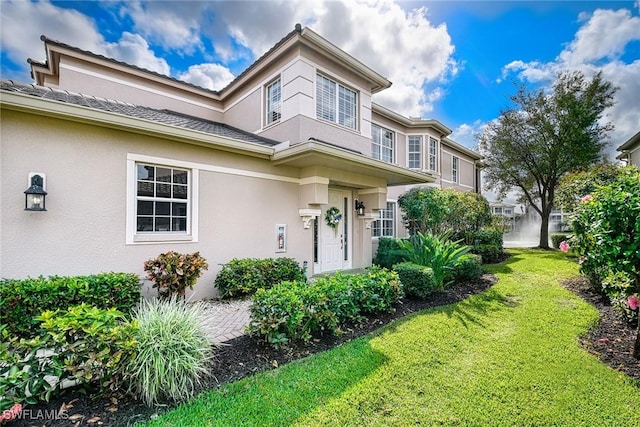 exterior space featuring a front yard