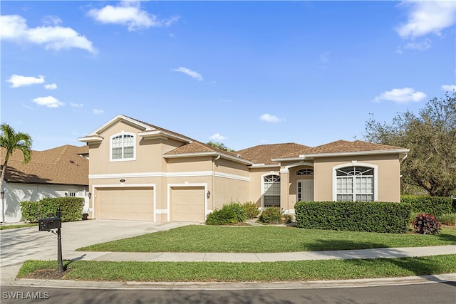 view of front of property with a garage