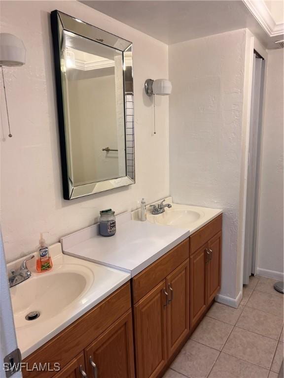 bathroom with vanity and tile patterned flooring