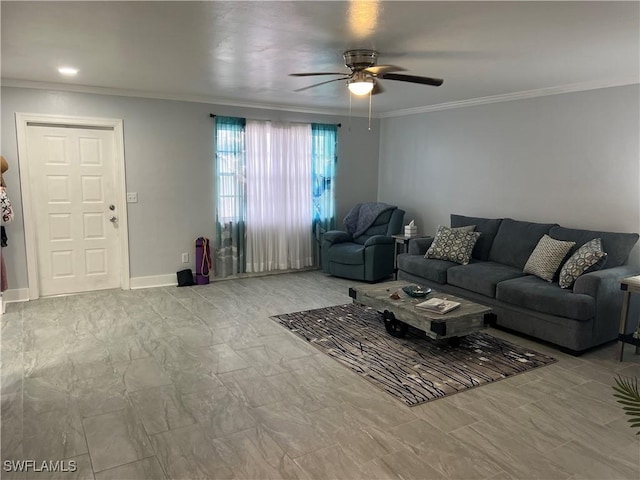 living room featuring ceiling fan and crown molding