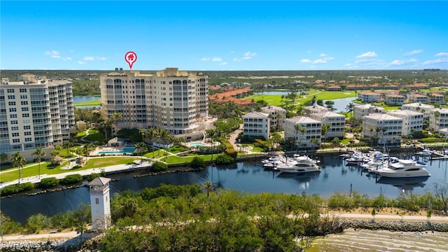 birds eye view of property featuring a water view