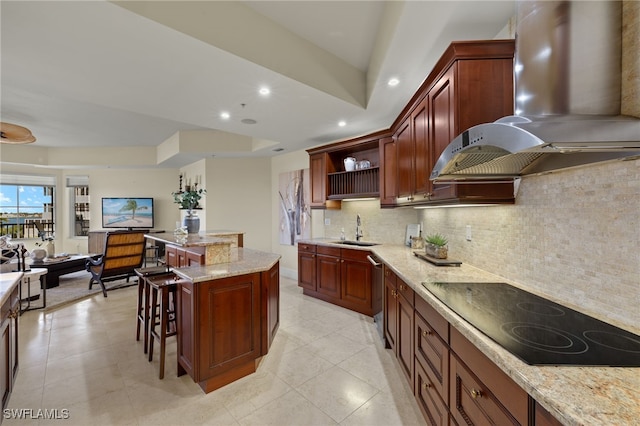 kitchen with black electric cooktop, recessed lighting, a sink, backsplash, and island exhaust hood