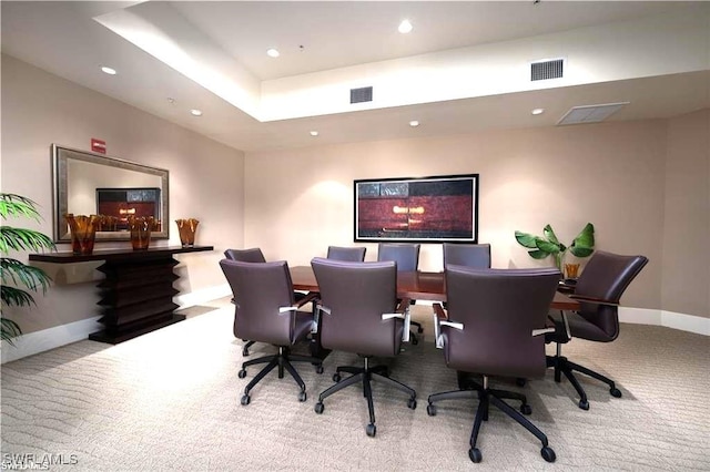 carpeted office space featuring baseboards, visible vents, and recessed lighting