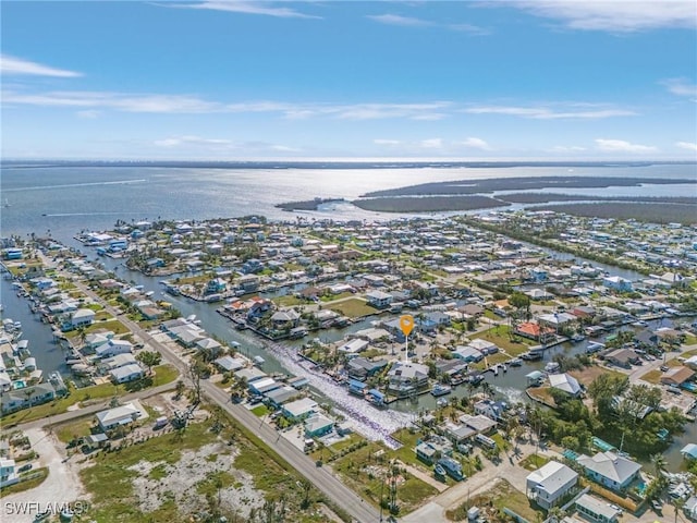 aerial view with a residential view and a water view