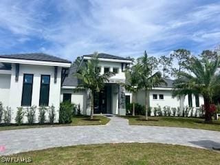 view of front of house with a front yard