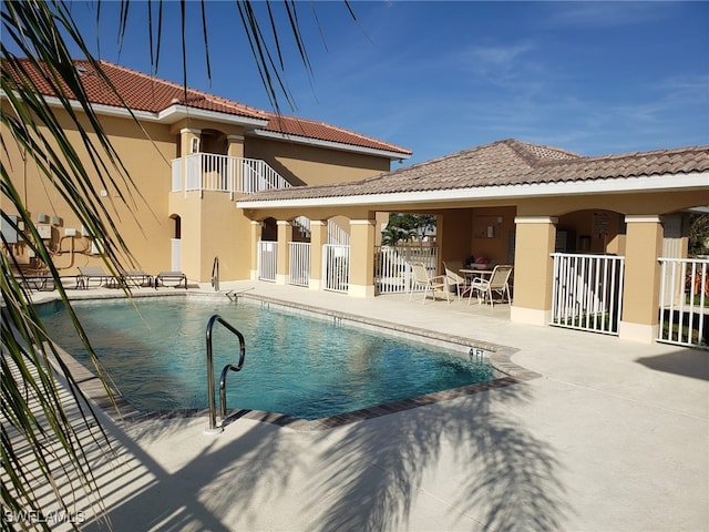 view of pool with a patio area