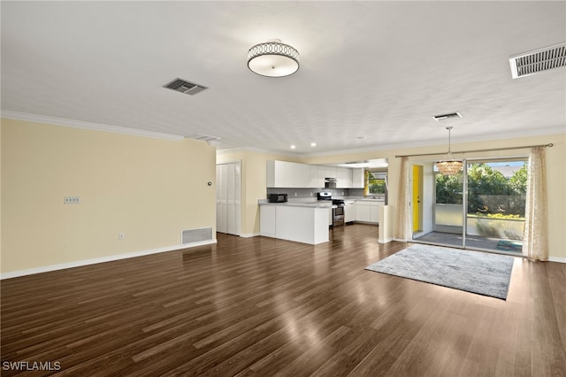 unfurnished living room with crown molding and dark hardwood / wood-style floors