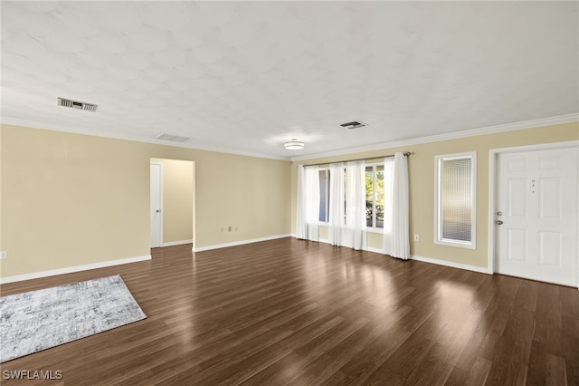 unfurnished living room with ornamental molding and dark wood-type flooring