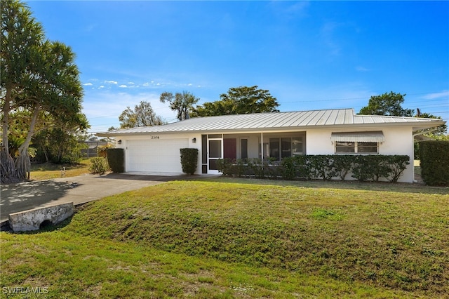 ranch-style home with a front yard and a garage