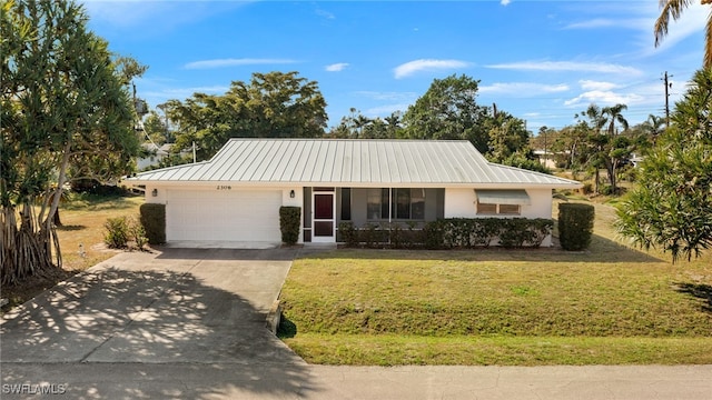 ranch-style home featuring a front lawn and a garage