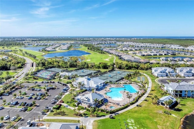 aerial view with a water view and a residential view