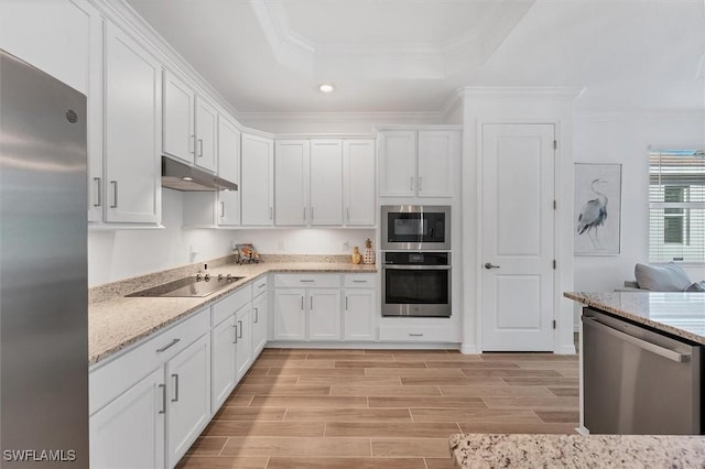 kitchen with stainless steel appliances, wood finish floors, white cabinetry, and under cabinet range hood