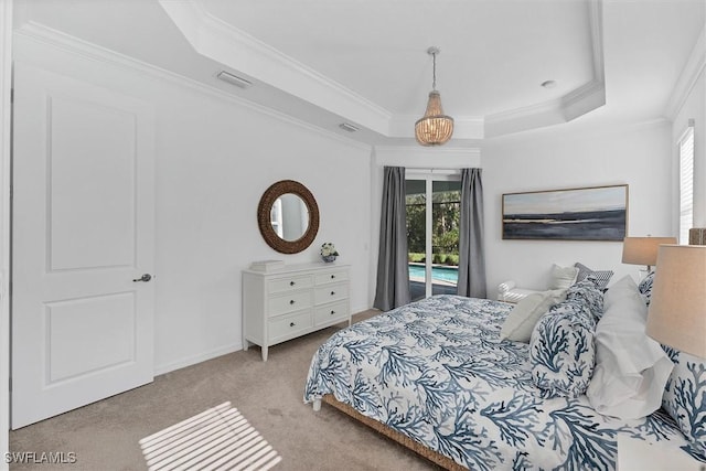 bedroom with access to exterior, a raised ceiling, visible vents, and light carpet