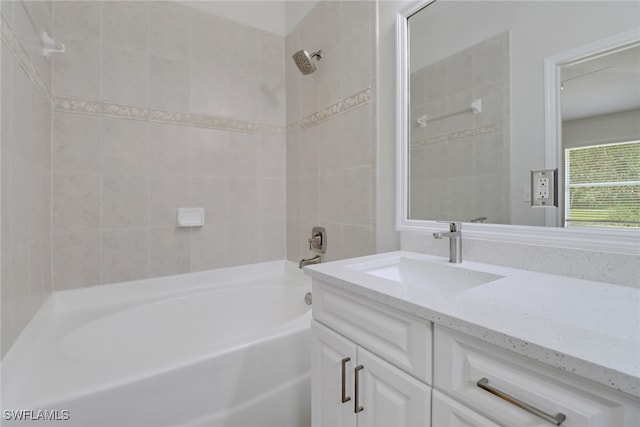 bathroom with shower / bathtub combination and vanity