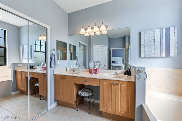 full bath featuring double vanity, a garden tub, and a sink