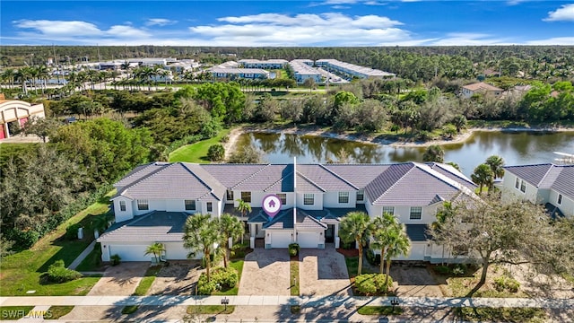 aerial view featuring a residential view and a water view