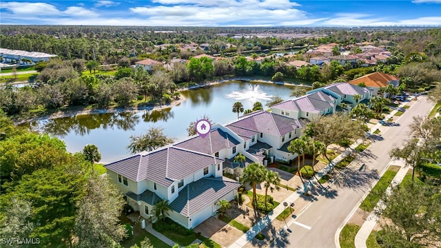 aerial view featuring a residential view and a water view